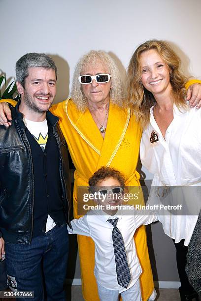 Singer Michel Polnareff and his son Louka standing between singer Gregoire and his wife Eleonore de Galard attend Michel Polnareff performs at Accor...