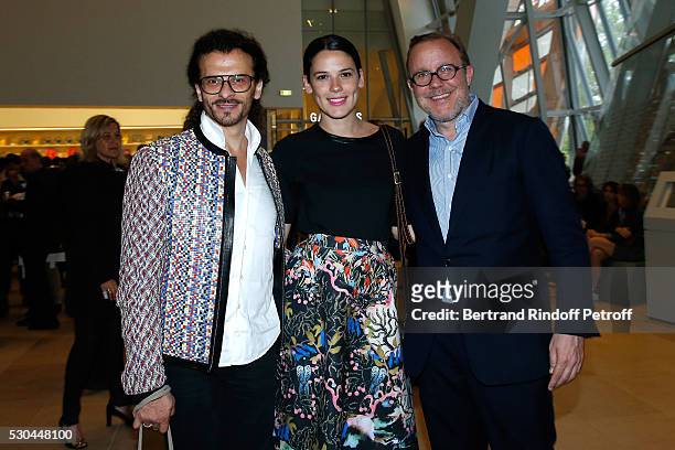 Galerist Lorenzo Fiaschi, Laura Salas Redondo and galerist Xavier Hufkens attend the "Observatory of Light, Work in Situ" : Foundation Louis Vuitton...