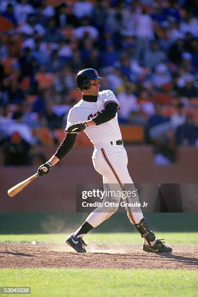 Will Clark of the San Francisco Giants swings during a 1987 season game at Candlestick Park in San Francisco, California.