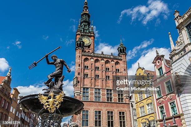 king neptune statue in the long market, dlugi targ, with town hall clock, gdansk, poland, europe - dlugi targ stock pictures, royalty-free photos & images