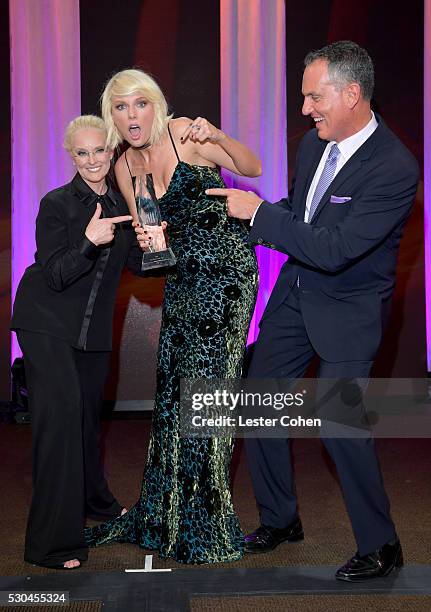 Honoree Taylor Swift accepts the BMI Pop Writer of the Year Award from BMI Vice President & General Manager, Writer/Publisher Relations Barbara Cane...