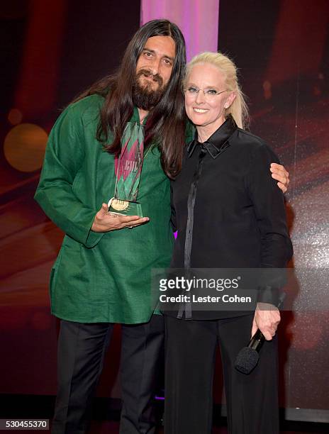 Producer/songwriter Jeff Bhasker accepts award onstage from BMI Vice President & General Manager, Writer/Publisher Relations Barbara Cane at The 64th...