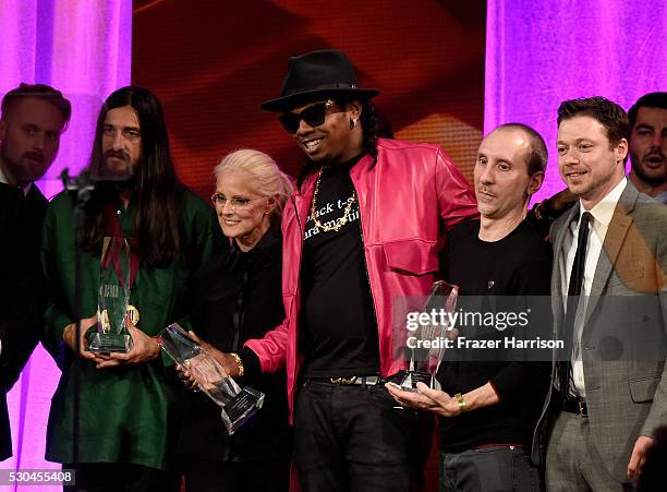 Vice President & General Manager, Writer/Publisher Relations Barbara Cane and honoree Trinidad James with awards onstage at The 64th Annual BMI Pop...