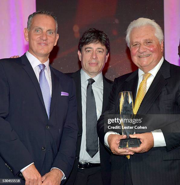 President & CEO Mike O'Neill, Sony/ATV Music Publishing US Co-President Rick Krim, and Sony/ATV CEO Martin Bandier pose with award at The 64th Annual...