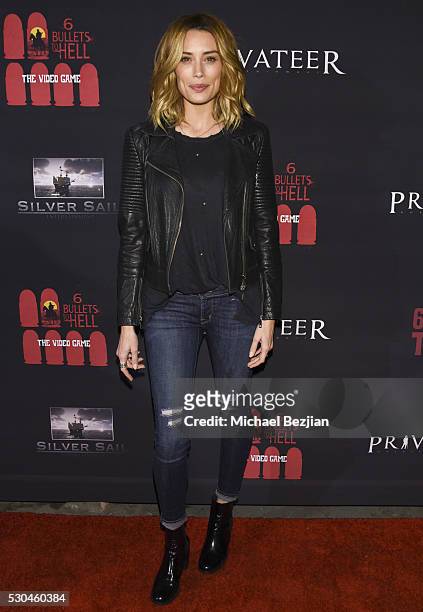 Actress Arielle Vandenberg arrives at the "6 Bullets To Hell" Mobile Game Launch Party on May 10, 2016 in Los Angeles, California.