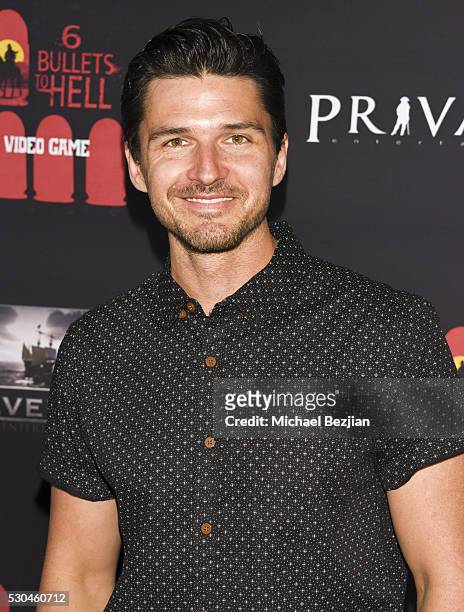 Actor Russell Cummings arrives at the "6 Bullets To Hell" Mobile Game Launch Party on May 10, 2016 in Los Angeles, California.