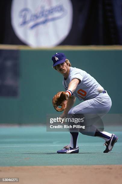 Ron Cey of the Los Angeles Dodgers backhands a catch during an MLB game at Veterans Stadium in Philadelphia, Pennsylvania. Ron Cey played for the Los...