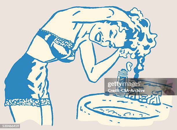 woman washing hair in sink - bra stock illustrations