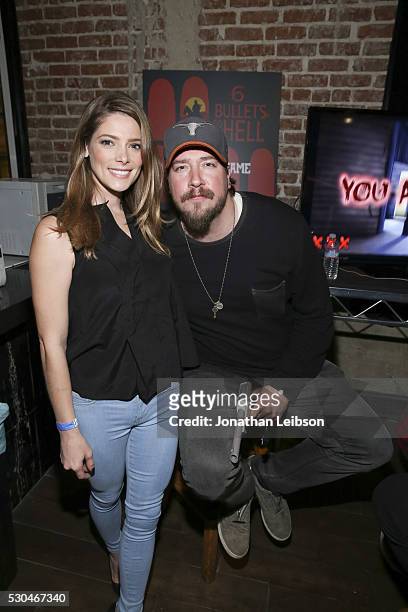 Actors Ashley Greene and Tanner Beard pose for a portrait at the "6 Bullets To Hell" Mobile Game Launch Party on May 10, 2016 in Los Angeles,...