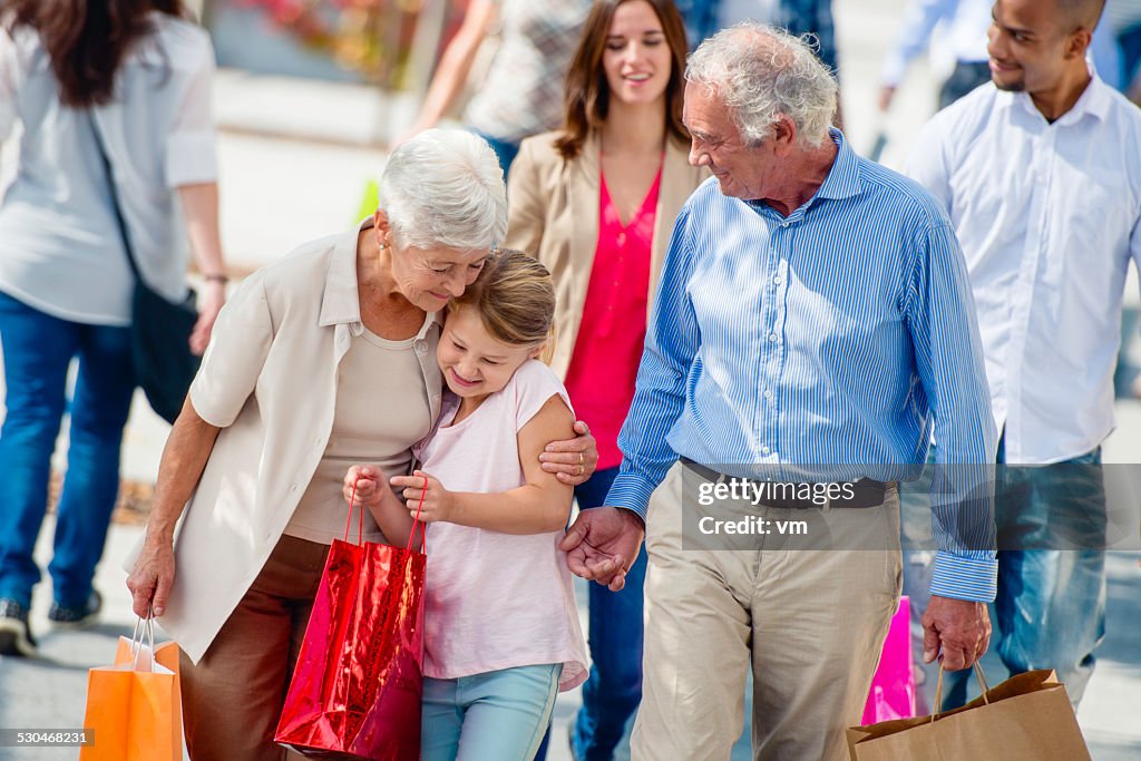 Grandparents Shopping with Their Granddaughter