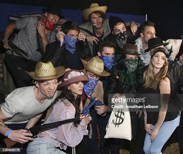 Group portrait taken at the "6 Bullets To Hell" Mobile Game Launch Party on May 10, 2016 in Los Angeles, California.