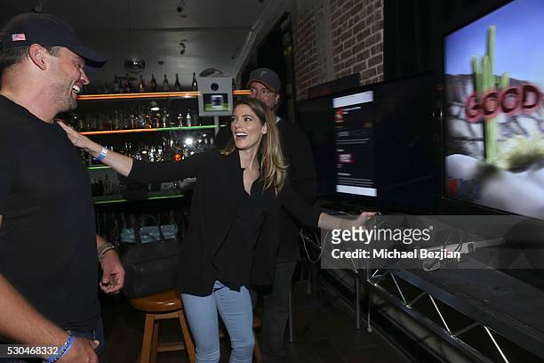 Actors Tanner Beard and Ashley Greene attend the "6 Bullets To Hell" Mobile Game Launch Party on May 10, 2016 in Los Angeles, California.