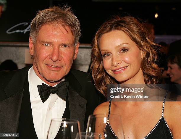 Actors Harrison Ford and Calista Flockhart pose during the 33rd AFI Life Achievement Award tribute to George Lucas at the Kodak Theatre on June 9,...