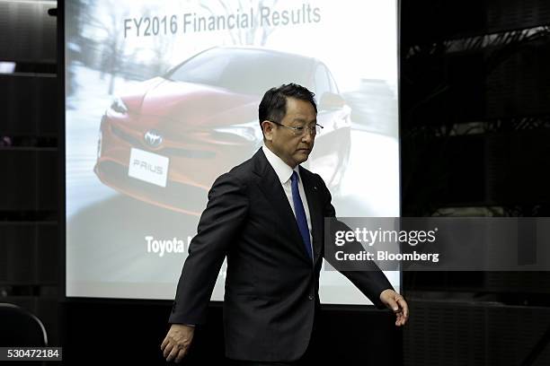 Akio Toyoda, president of Toyota Motor Corp., arrives for a news conference in Tokyo, Japan, on Wednesday, May 11, 2016. Toyota said annual net...