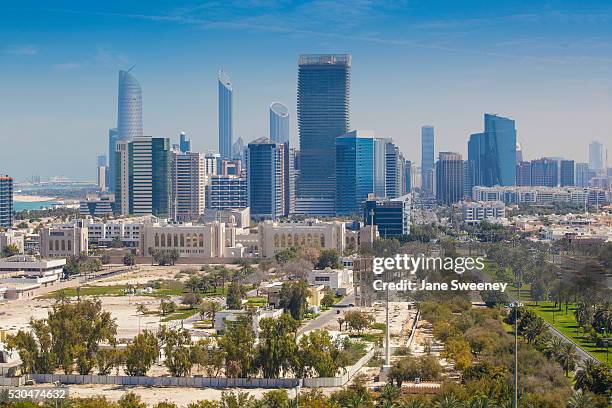 view of city skyline, abu dhabi, united arab emirates, middle east - jane boone stock-fotos und bilder