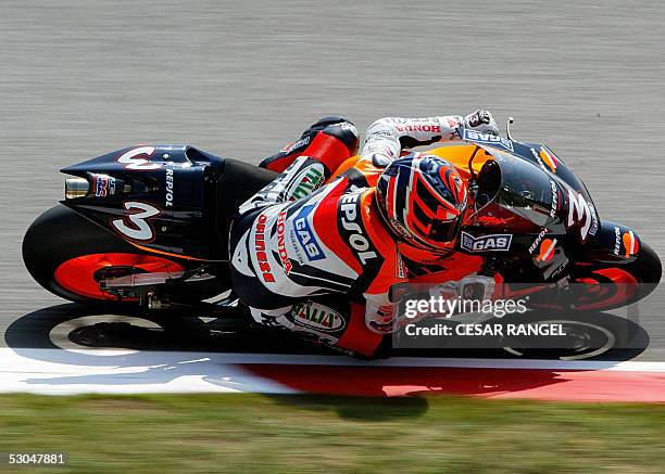 Ilalian Max Biaggi rides his Honda during the first free practice of the Moto GP Catalonia Grand Prix 10 June 2005, at the Catalonia racertrack in...