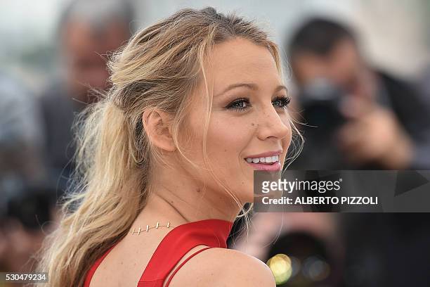 Actress Blake Lively smiles while posing on May 11, 2016 during a photocall for the film "Cafe Society" ahead of the opening of the 69th Cannes Film...