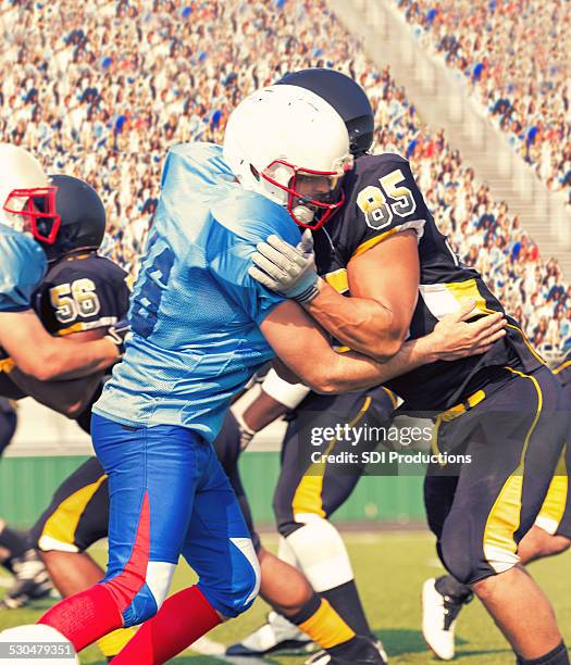 Nfl Defensive Line Block American Football Stadium Arena Vertical Photos and Premium High Res ...