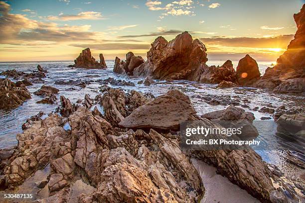 rockformation at sunset - newport beach stockfoto's en -beelden