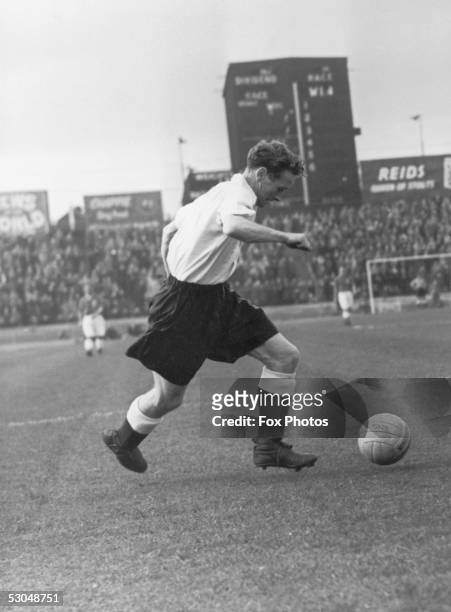 Preston North End and England outside right, Tom Finney, in action during a match between the England World Cup team and a Canadian touring side at...