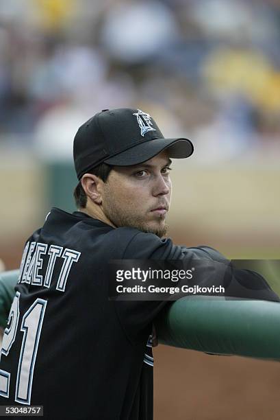 Pitcher Josh Beckett of the Florida Marlins watches the action from the dugout as the Marlins played the Pittsburgh Pirates at PNC Park on June 1,...