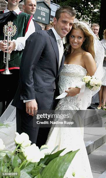 Rafael van der Vaart and Sylvie Meiss pose during their wedding ceremony on June 10, 2005 in Heemskerk, Netherlands.
