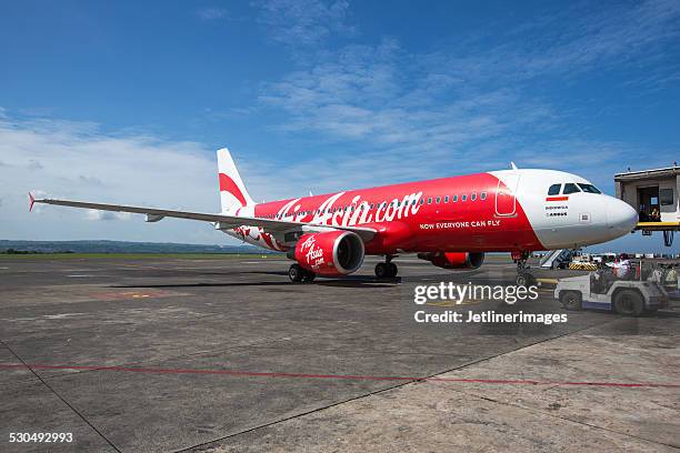 air asia indonesien flug qz8501 nach singapur fehlt - air asia stock-fotos und bilder