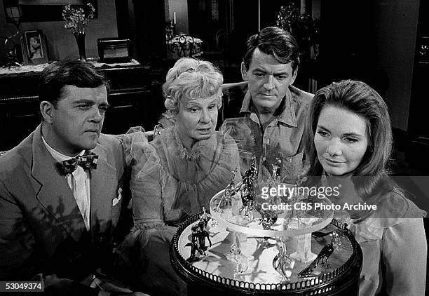 American actors Pat Hingle, Shirley Booth , Hal Holbrook and Barbara Loden admire the titular assortment of animal figurines in a scene from the...