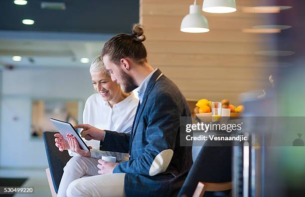 business people at cafe - old woman young man stock pictures, royalty-free photos & images