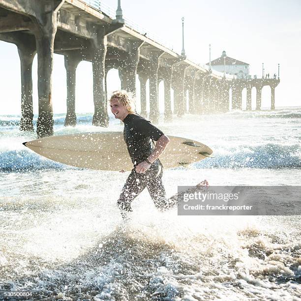 J Riddle Surfer 77 Hot Tough Guy Silhouette Stock Photos, High-Res Pictures, and Images ...