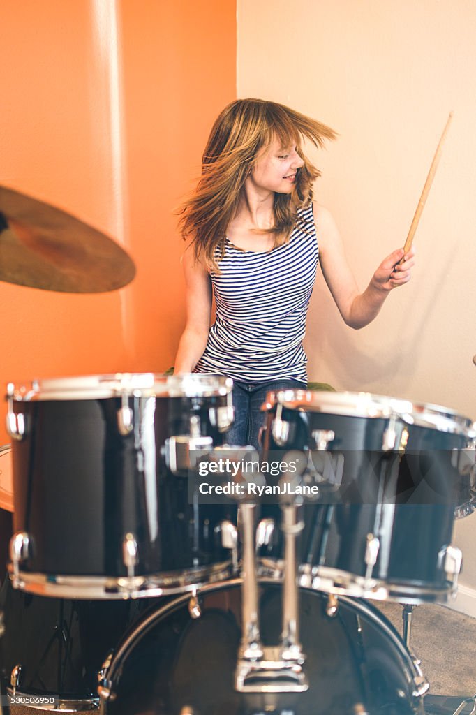 Girl Playing Rock and Roll Drums