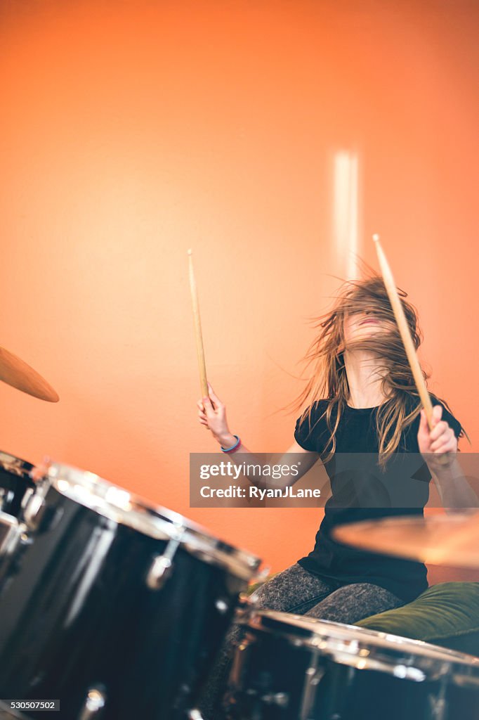 Girl Playing Rock and Roll Drums