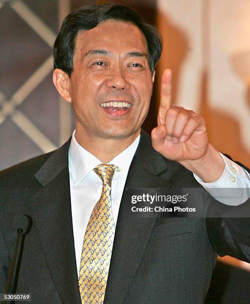 Chinese Commerce Minister Bo Xilai gestures at a press conference following the conclusion of talks between the European Union and China on June 11,...