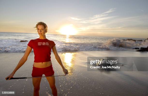 Golfer Anna Rawson, a native Aussie and recent graduate of the University of Southern California, takes a workout break on the Pacific coast, May...