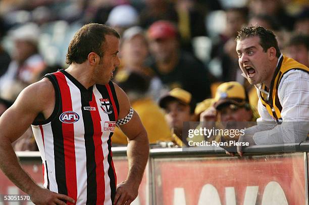 Fraser Gehrig for the Saints listens to the abuse from a Hawks fan during the round twelve AFL match between the Hawthorn Hawks and the St.Kilda...