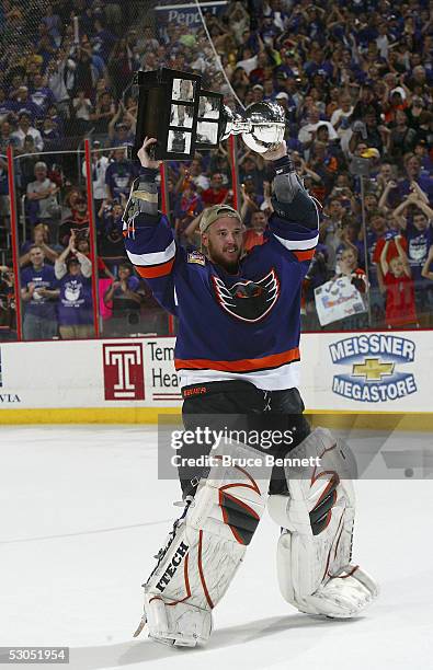 Antero Niittymaki of the Philadelphia Phantoms celebrates with the Calder Cup after the Phantoms defeated the Chicago Wolves 5-2 to sweep the series...