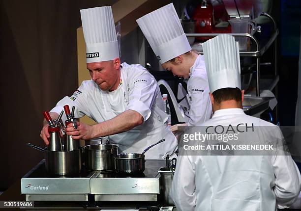 Belgian chef Peter Aesert competes with his teamates, coach Jo Nelissen and commis Michelle Boone during the biennial world chef championship Bocuse...