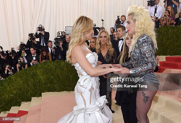 Lady Gaga and Kate Hudson arrive for the "Manus x Machina: Fashion In An Age Of Technology" Costume Institute Gala at Metropolitan Museum of Art on...