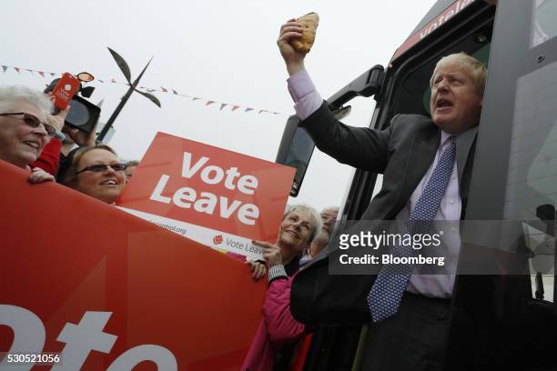 Boris Johnson, the former mayor of London, waves a Cornish Pasty during the first day of a nationwide bus tour to campaign for a so-called Brexit in...