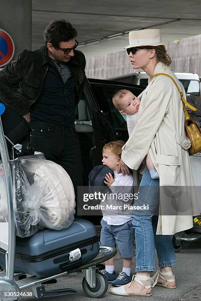Actress Melissa George, her sons Solal Samuel Glenn Blanc and Raphael Blanc; and companion Jean-David Blanc arrive at Nice airport during the annual...