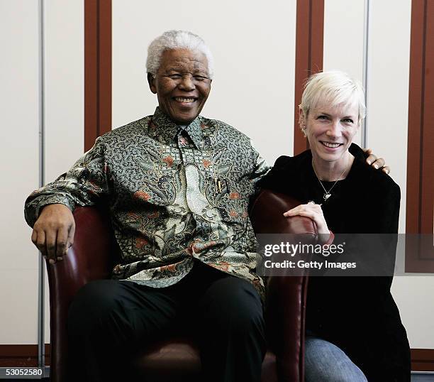 Artist Annie Lennox poses with Nelson Mandela at a photocall ahead of tonight's "46664 Arctic" concert, at the Rica Hotel on June 11, 2005 in Tromso,...