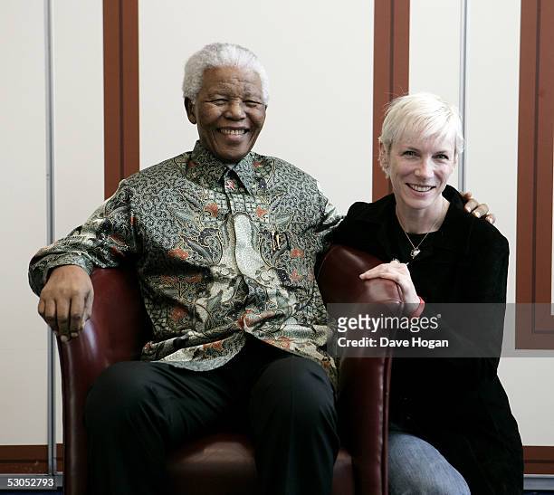 Artist Annie Lennox poses with Nelson Mandela at a photocall ahead of tonight's "46664 Arctic" concert, at the Rica Hotel on June 11, 2005 in Tromso,...