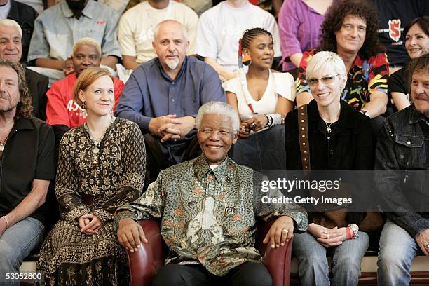 Artists including Anneli Drecker and Annie Lennox pose with Nelson Mandela at a photocall ahead of tonight's "46664 Arctic" concert, at the Rica...