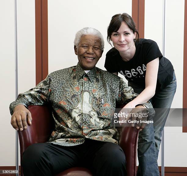 Artist Sharon Corr poses with Nelson Mandela at a photocall ahead of tonight's "46664 Arctic" concert, at the Rica Hotel on June 11, 2005 in Tromso,...