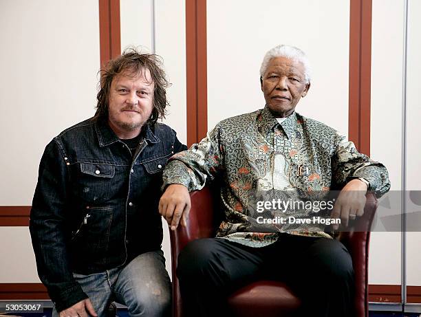 Artist Zucchero poses with Nelson Mandela at a photocall ahead of tonight's "46664 Arctic" concert, at the Rica Hotel on June 11, 2005 in Tromso,...