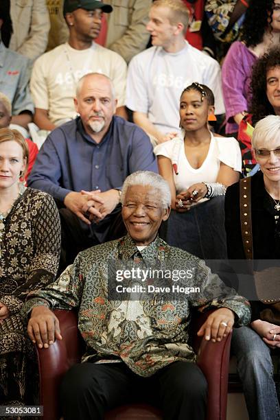 Artists including Anneli Drecker , Annie Lennox , Peter Gabriel and Thandiswa Mazwai pose with Nelson Mandela at a photocall ahead of tonight's...