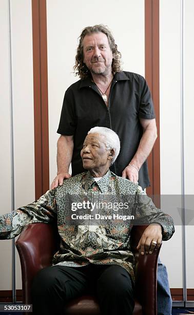 Artist Robert Plant poses with Nelson Mandela at a photocall ahead of tonight's "46664 Arctic" concert, at the Rica Hotel on June 11, 2005 in Tromso,...