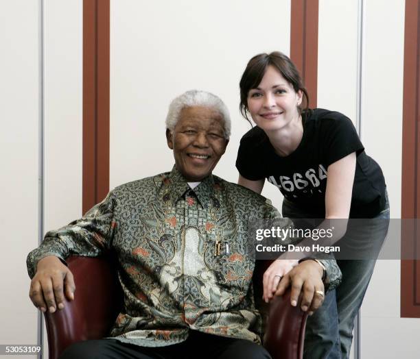 Artist Sharon Corr poses with Nelson Mandela at a photocall ahead of tonight's "46664 Arctic" concert, at the Rica Hotel on June 11, 2005 in Tromso,...