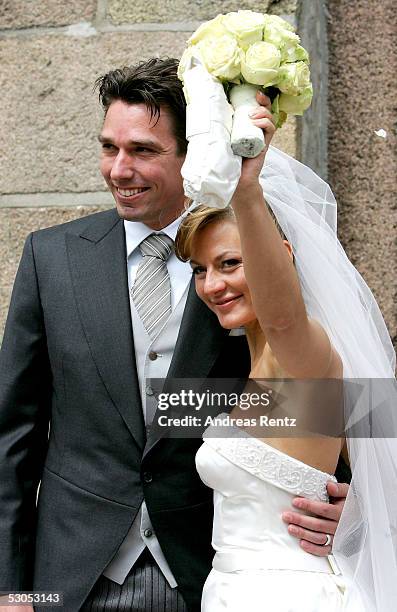 Ex Tennis player Michael Stich and his wife Alexandra Stich, maiden name Rikowski, pose at the Sankt Severin church on June 11, 2005 at Sylt, in...