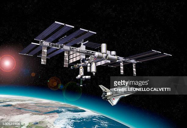 international space station and shuttle, artwork. - estación espacial internacional fotografías e imágenes de stock
